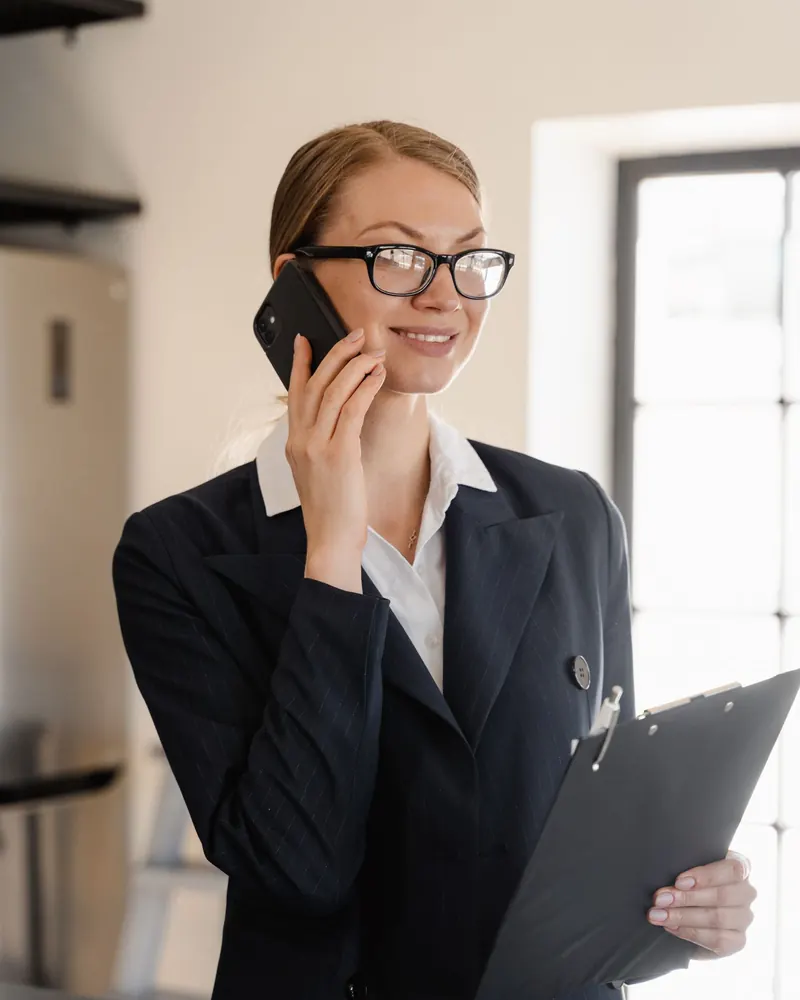 Relentless Funding advisor on a phone call walking a business owner through funding options
